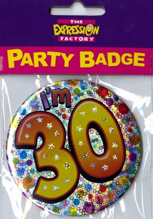 A badge that says "I'm 30" on it.