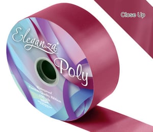 A close-up of a roll of Eleganza poly ribbon.