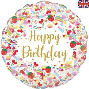 A happy birthday balloon with candy and sprinkles on it.