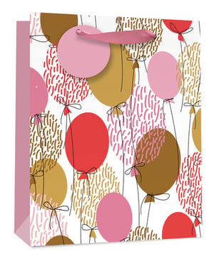 A gift bag with pink and brown balloons on it.