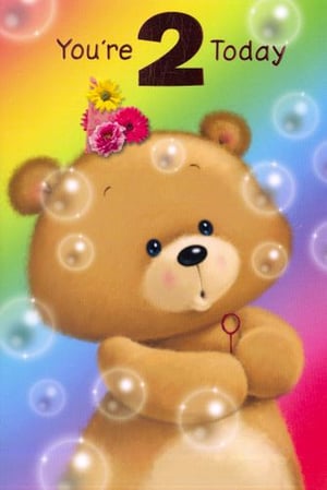 A teddy bear is holding a soap bubble and says, "You're 2 today."