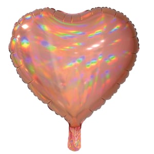 A pink heart-shaped balloon with a handle.