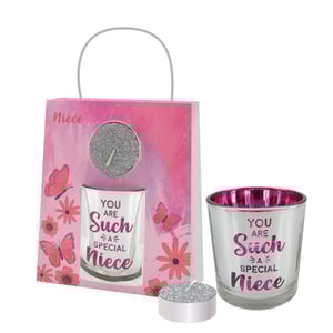 A gift for a special niece includes a candle and a glass.