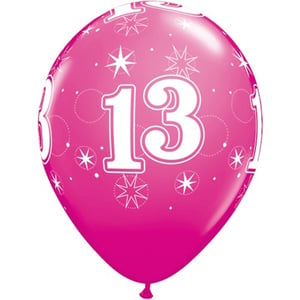 A pink balloon with the number 13 written on it.