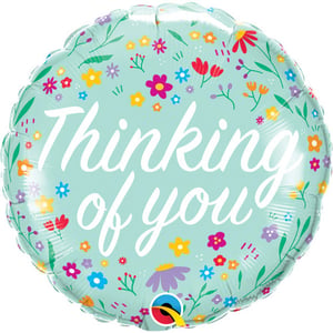 A balloon with flowers on it, thinking of you.