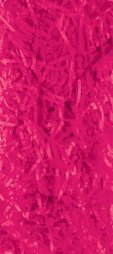 A pile of pink shredded paper with a white background.