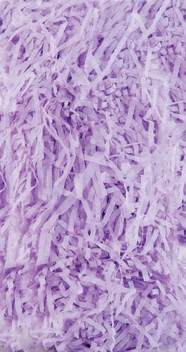 There are no grammatical errors in the sentence provided: "a pile of purple shredded paper on a table."