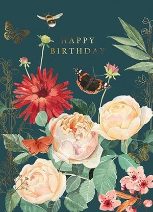 A birthday card with flowers and butterflies on a dark blue background.