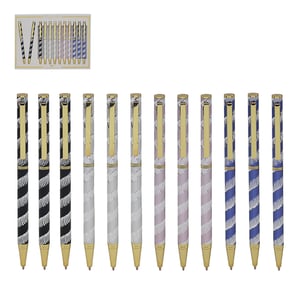 A set of pens with zebra print on them.