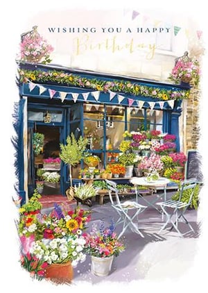 A birthday card with a painting of a flower shop, decorated with flowers.