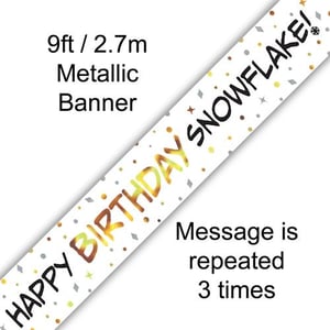 A metallic birthday banner saying "Happy Birthday Snowflake."