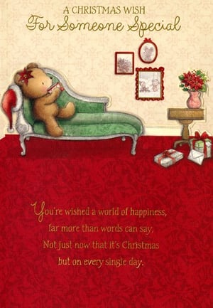 A Christmas wish for someone special with a teddy bear on a chaise lounge.
