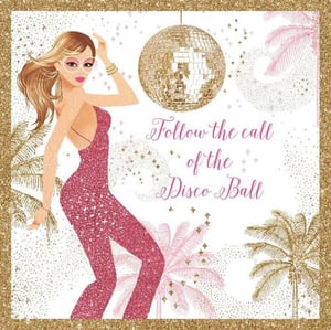 A woman in a pink jumpsuit dances in front of a disco ball.