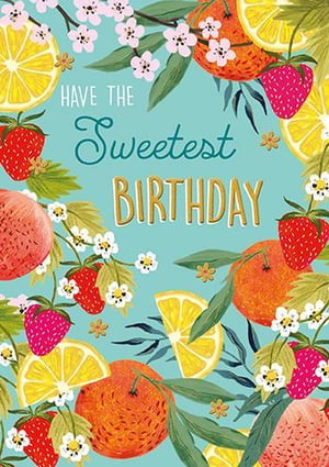 A birthday card with strawberries, oranges, lemons, and flowers on a blue background.