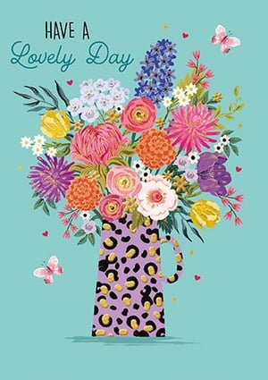 A vase filled with flowers and butterflies is on a blue background.