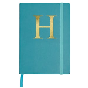 A blue book with a gold letter "H" on it.