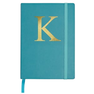 A blue book with a gold letter "K" on it.