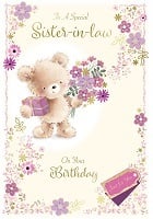 A teddy bear is holding a bouquet of flowers and a gift on a birthday card for a sister-in-law.
