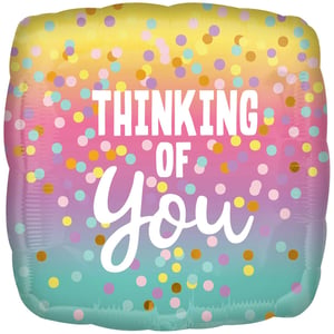a balloon that says thinking of you on it