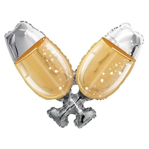 a silver and gold balloon in the shape of two champagne glasses