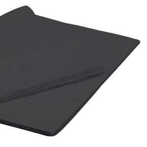 a close up of a piece of black paper on a white background .
