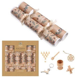 a box of tom smith crackers with a christmas theme