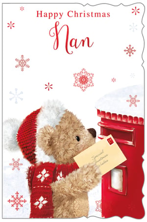 a teddy bear wearing a santa hat is putting a letter in a mailbox .