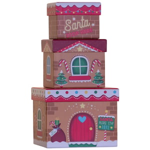 three santa stop here boxes are stacked on top of each other