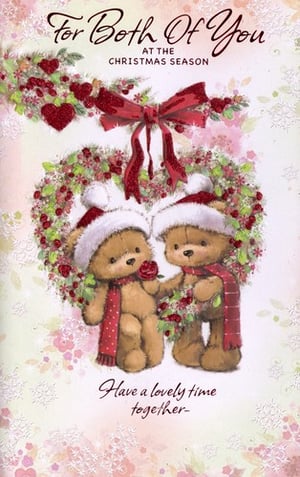 a christmas card that says for both of you at the christmas season