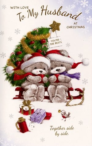 a christmas card with two teddy bears sitting under a christmas tree