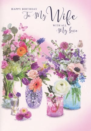 A birthday card that says "Happy Birthday to my wife with all my love."