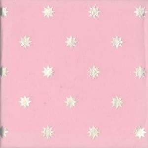 a pink background with white stars on it