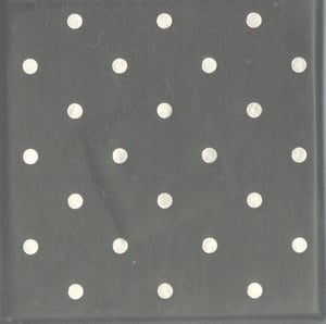 a black background with white polka dots on it