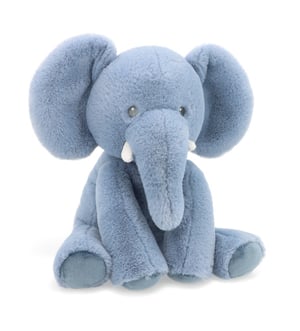 A blue stuffed elephant is sitting on a white background.