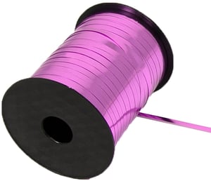 a spool of purple metallic ribbon with a black cap