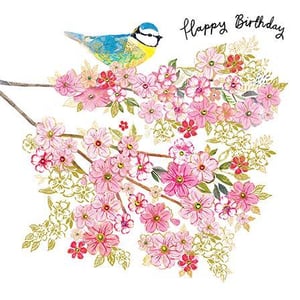 a birthday card with a bird sitting on a branch of pink flowers .
