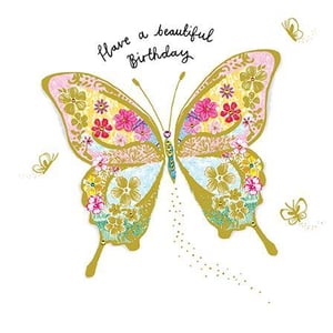a birthday card with a butterfly decorated with flowers and the words `` have a beautiful birthday '' .