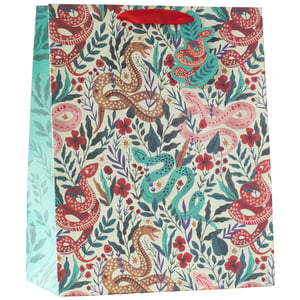 a gift bag with snakes and flowers on it