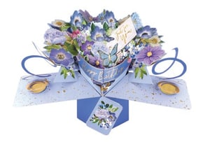 a happy birthday card with purple flowers and butterflies