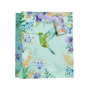 a gift bag with a hummingbird and flowers on it