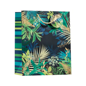 a gift bag with tropical leaves on it