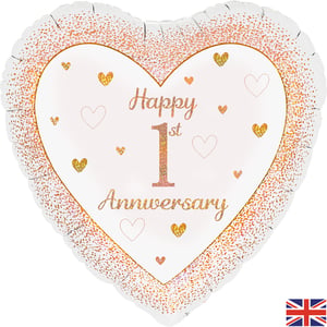 a heart shaped balloon that says happy 1st anniversary
