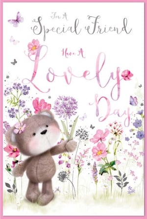 a teddy bear in a field of flowers with the words " for a special friend have a lovely day "