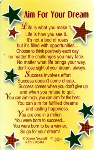 a card that says aim for your dream on it