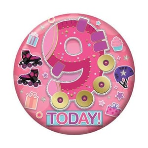 a pink birthday badge for a girl with roller skates and cupcakes .