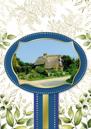 a picture of a thatched roofed house in a blue and gold frame