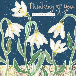 a card that says thinking of you at christmas