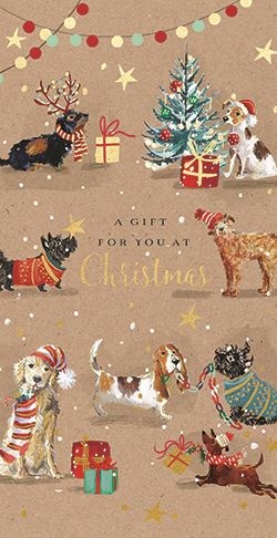 a christmas card with dogs and a christmas tree on it .