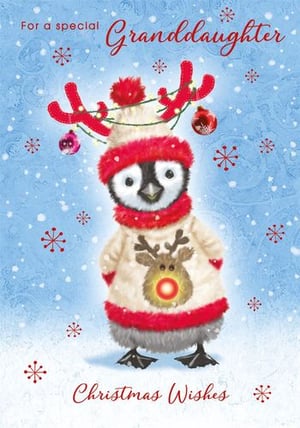 a christmas card for a special granddaughter with a penguin wearing a reindeer sweater .