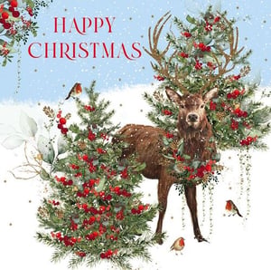 a christmas card with a deer surrounded by trees and berries